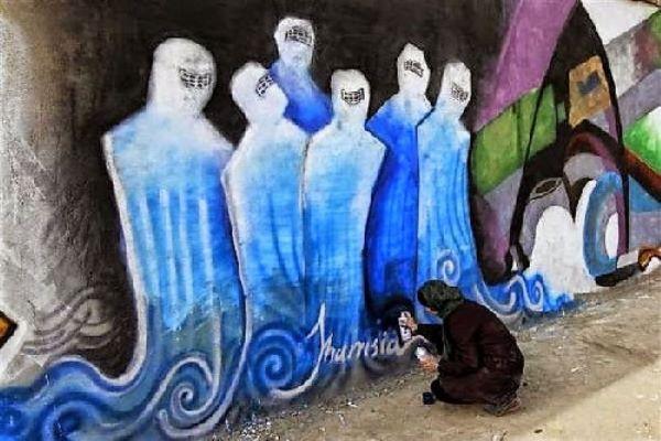 un murale del'artista shamsia hassani a kabul